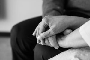 wrongful death claims lawsuits two people holding hands