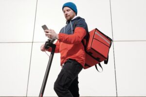 delivery man on scooter