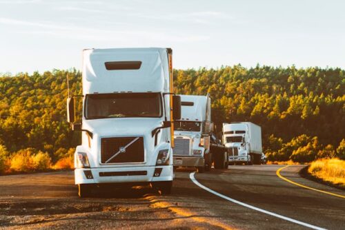 convoy of trucks on highway